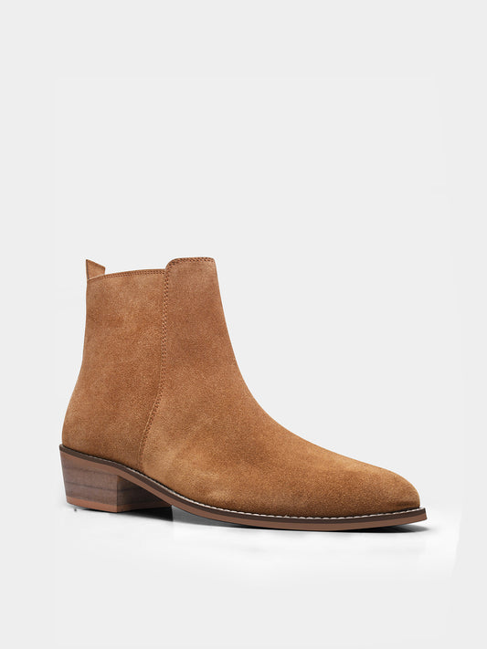 A men's luxury suede leather Chelsea boot with a cuban heel and zip side panels, in a camel color.