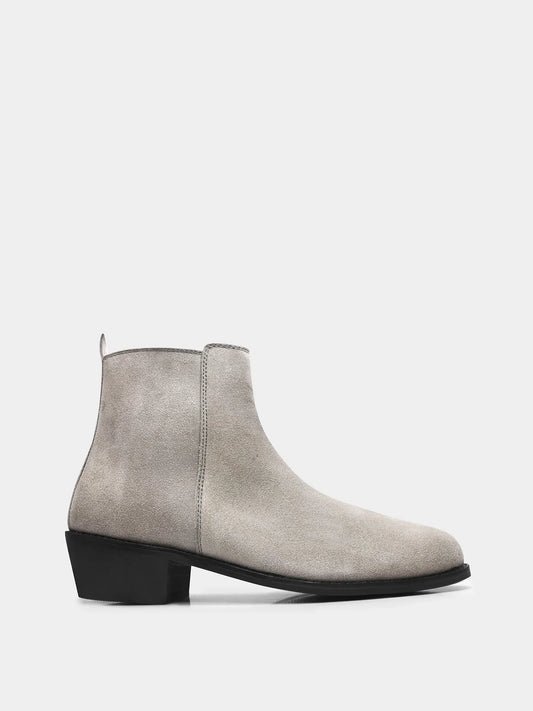 A men's luxury suede leather Chelsea boot with a cuban heel and zip side panels, in a gray color.