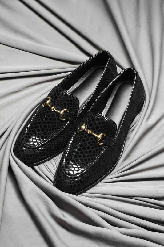 Pair of Black colour loafers with crocodile pattern and horsebit buckle in mid heel