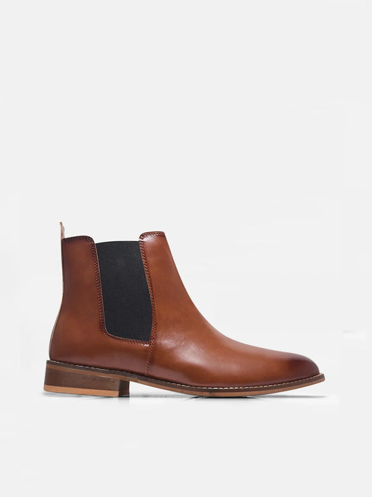 Brown leather Chelsea boot with side elastic and mid heel