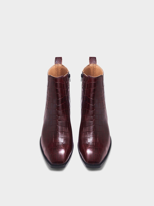 Pair of burgundy crocodile textured leather boots with Cuban heel