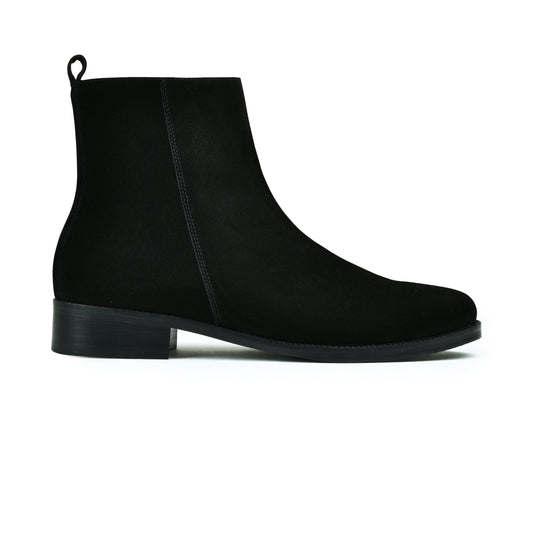 Black ankle boot on a white background