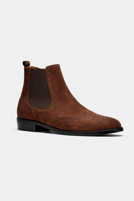 Brown suede Chelsea boot on a white background