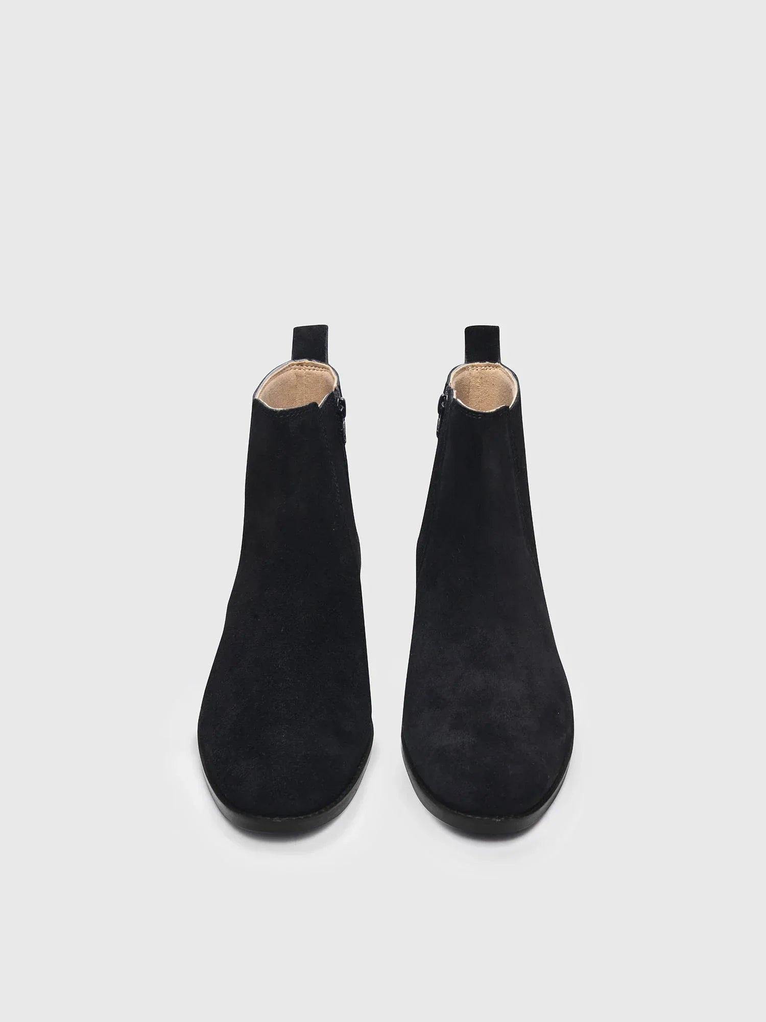 Pair of black boots with a side zip | RNK LUXE