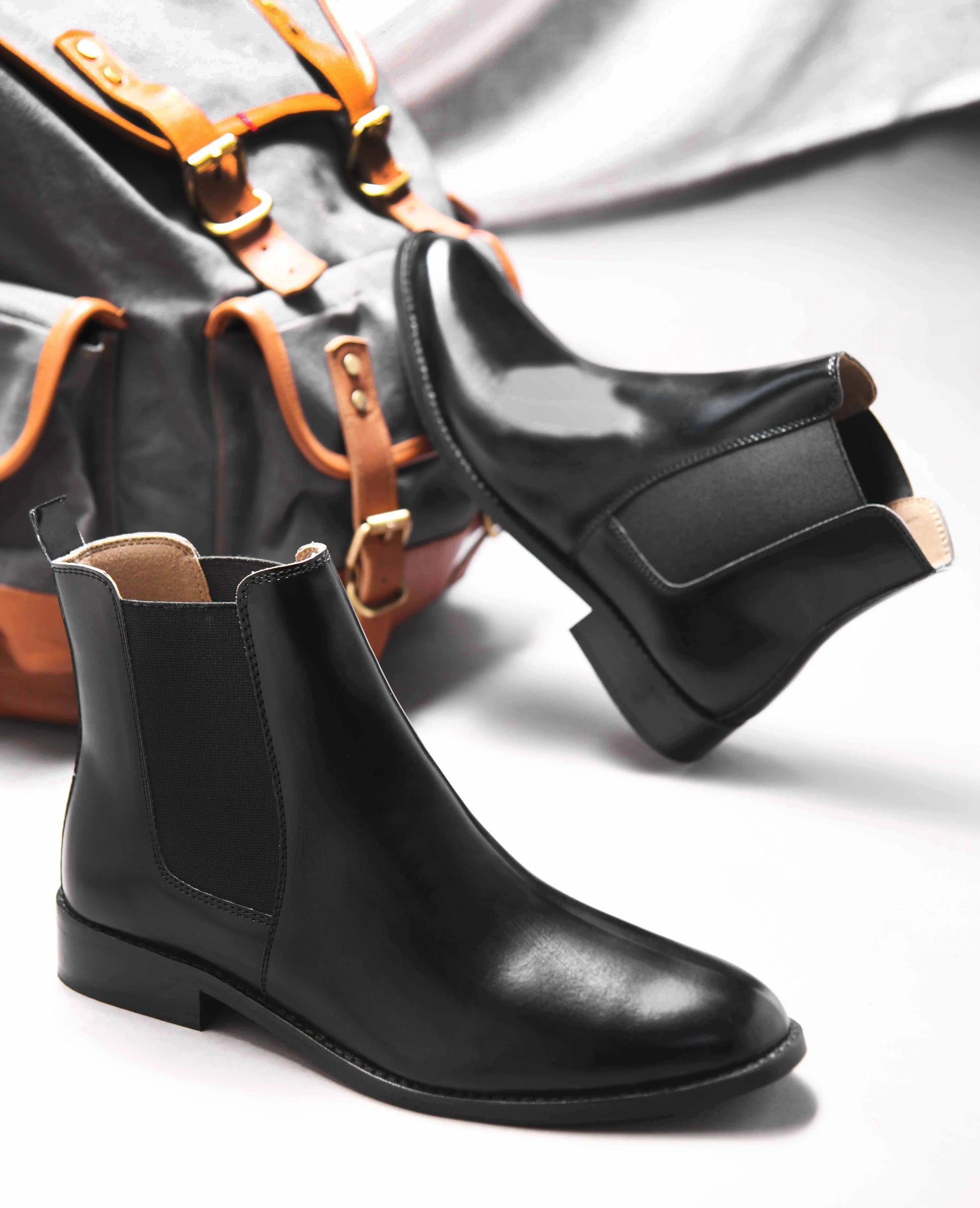 Black leather boots with side elastic and mid heel