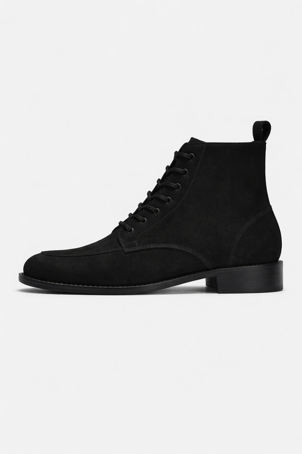 Black lace-up boot on a light gray background