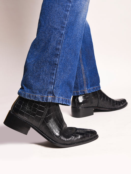 Men’s black crocodile-textured leather Chelsea boots with a sleek, pointed toe design