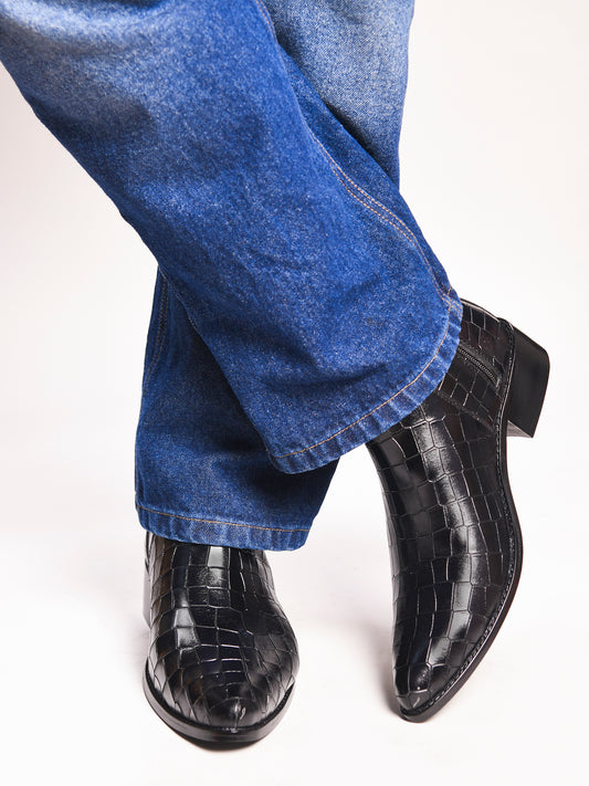 Men’s black crocodile-textured leather Chelsea boots with a sleek, pointed toe design