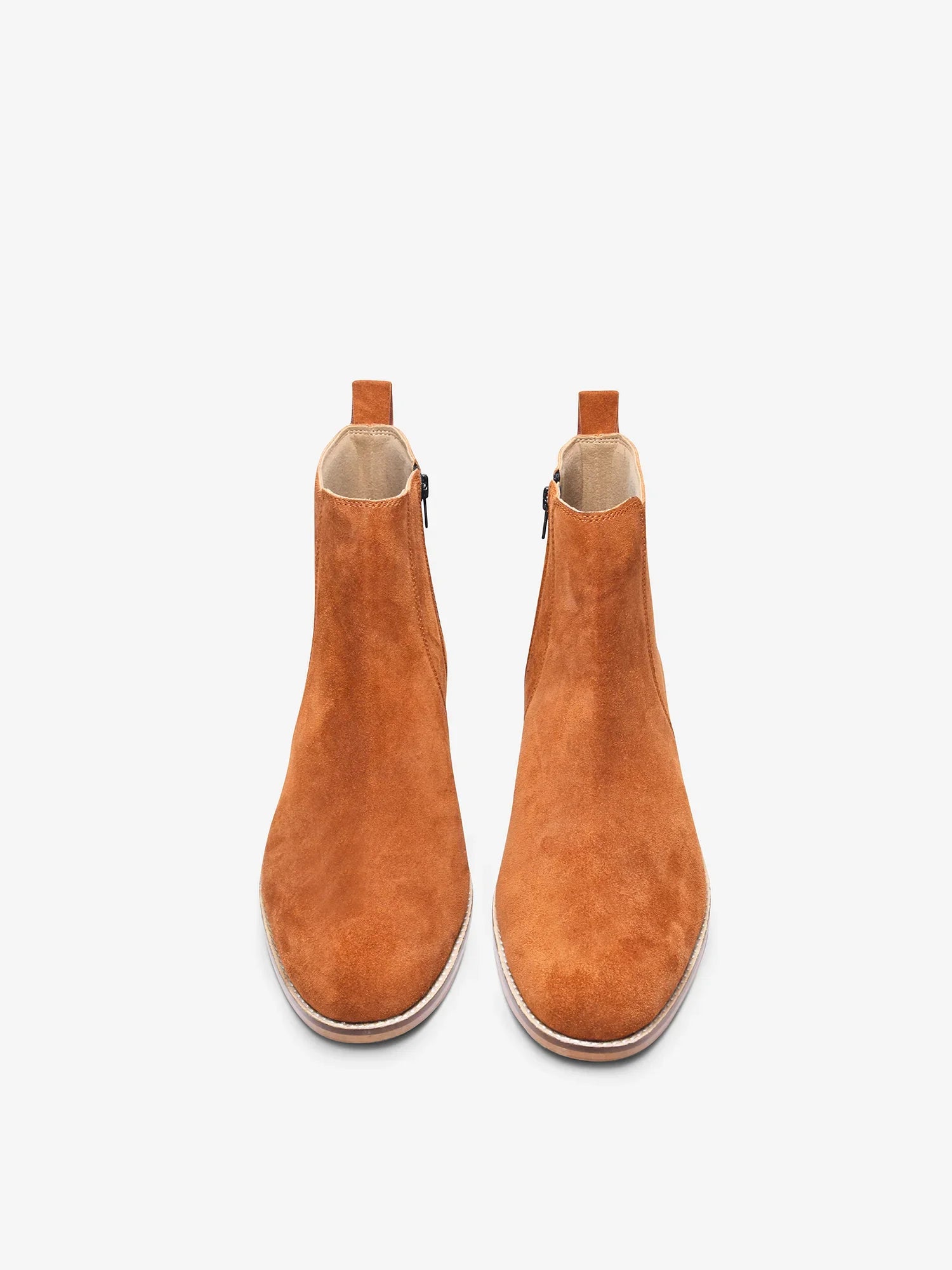 A men's luxury suede leather Chelsea boot with a cuban heel and zip side panels, in a tan color.