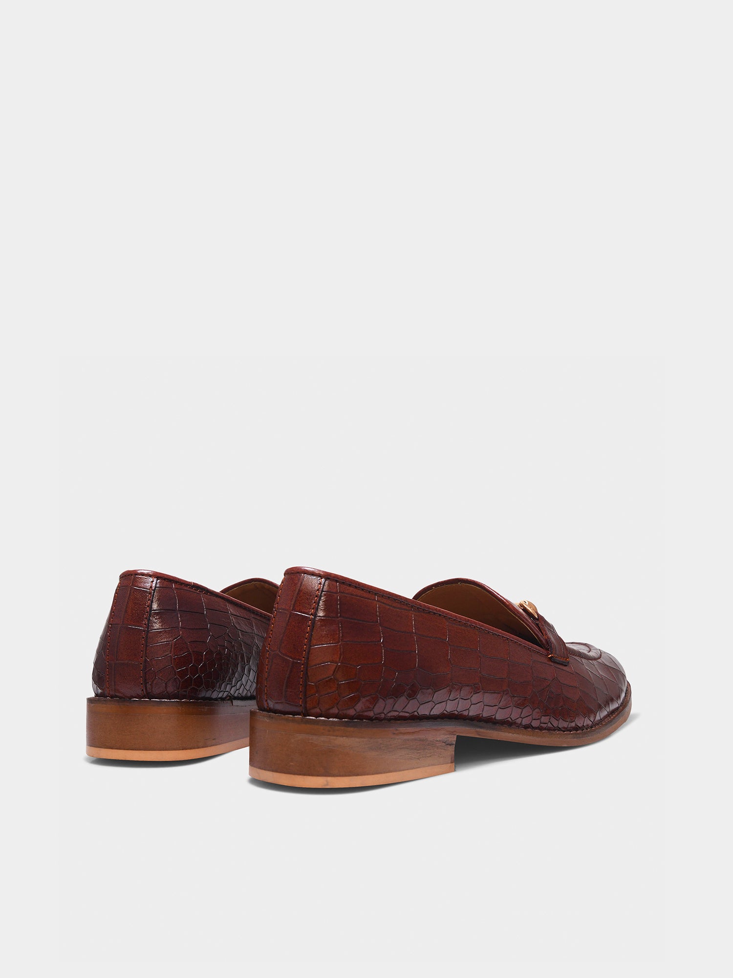 Tan leather horsebit loafers in crocodile texture