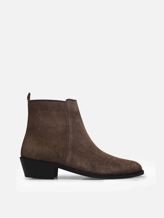 A men's luxury suede leather Chelsea boot with a cuban heel and zip side panels, in a brown color.
