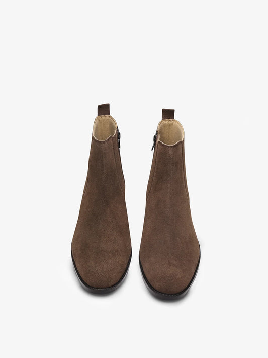A men's luxury suede leather Chelsea boot with a cuban heel and zip side panels, in a brown color.