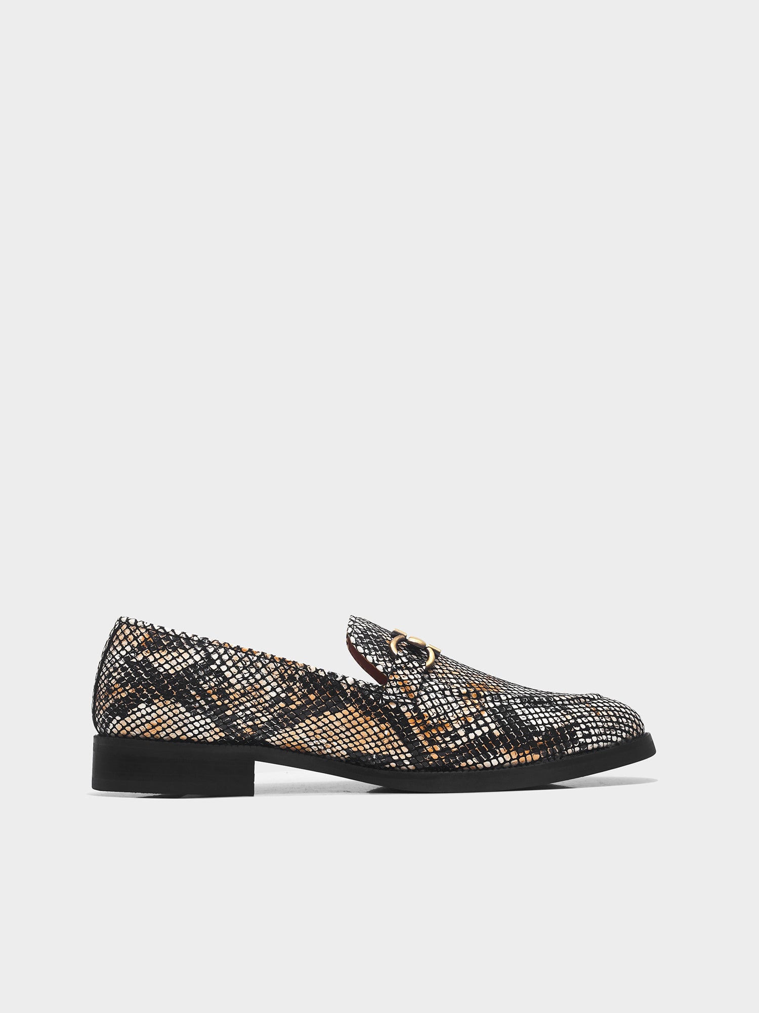 Golden and black snake-patterned penny loafer shoe on mid heel with a horsebit buckle