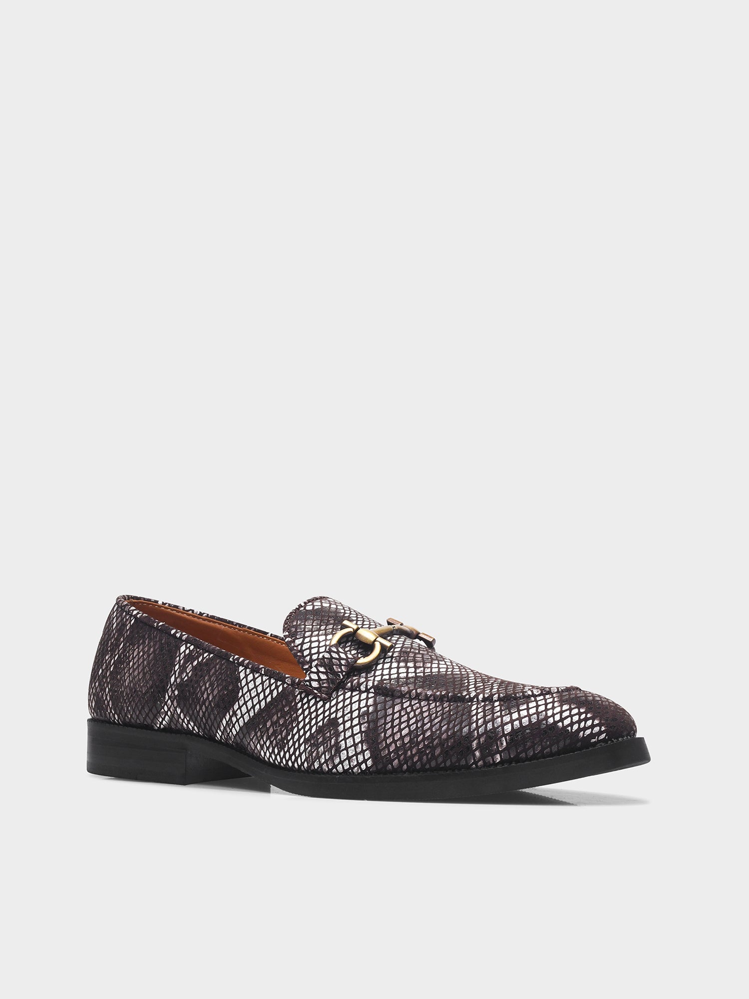 Brown and white snake-patterned penny loafer shoe on mid heel with a horsebit buckle