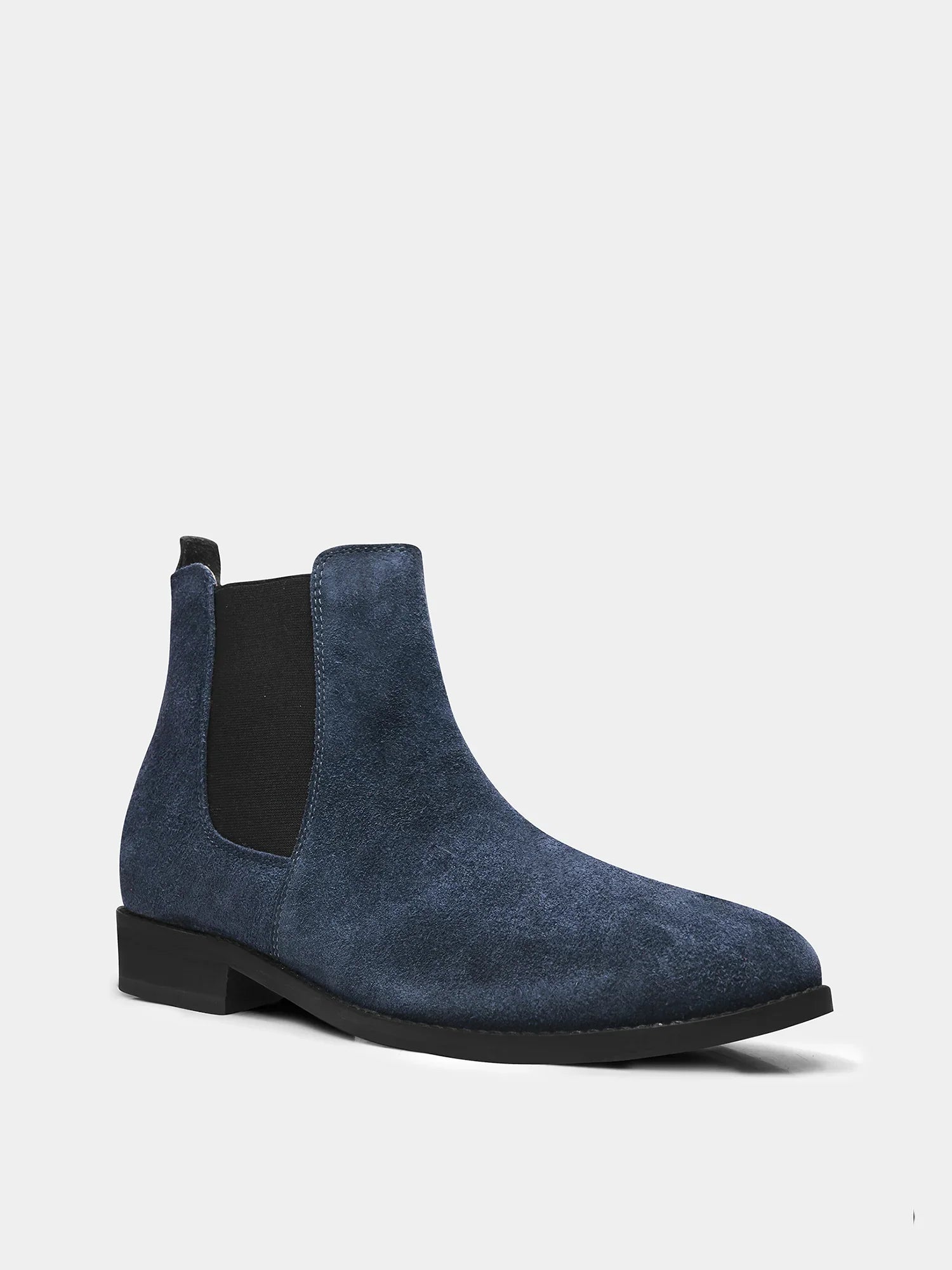 A men's luxury suede leather Chelsea boot with a cuban heel and elastic side panels, in a blue color.