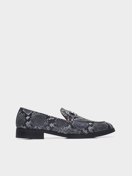 Black and white snake-patterned penny loafer shoe on mid heel with a horsebit buckle