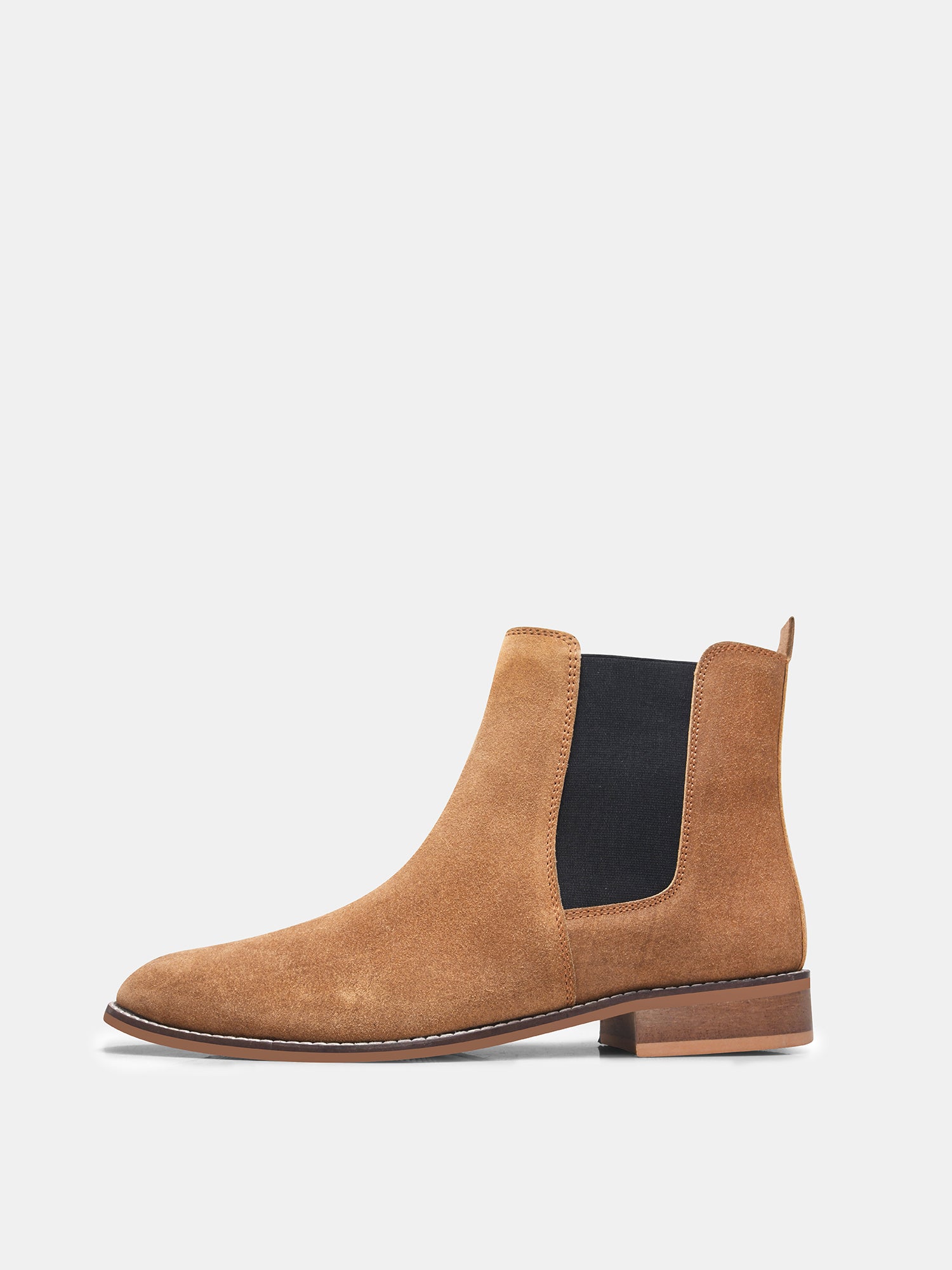 A men's luxury suede leather Chelsea boot with a mid heel and elastic side panels, in a tan color.