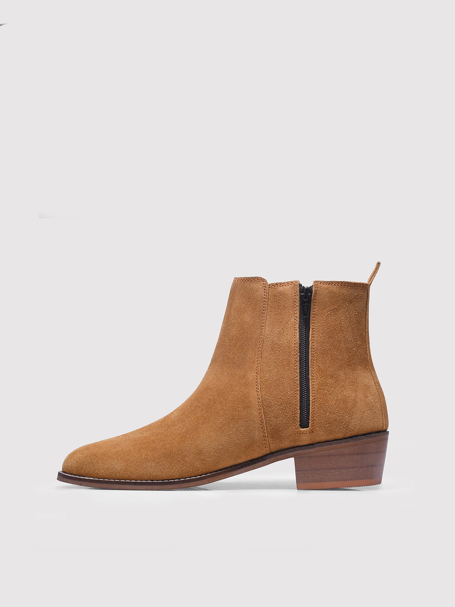 A men's luxury suede leather Chelsea boot with a cuban heel and zip side panels, in a camel color.