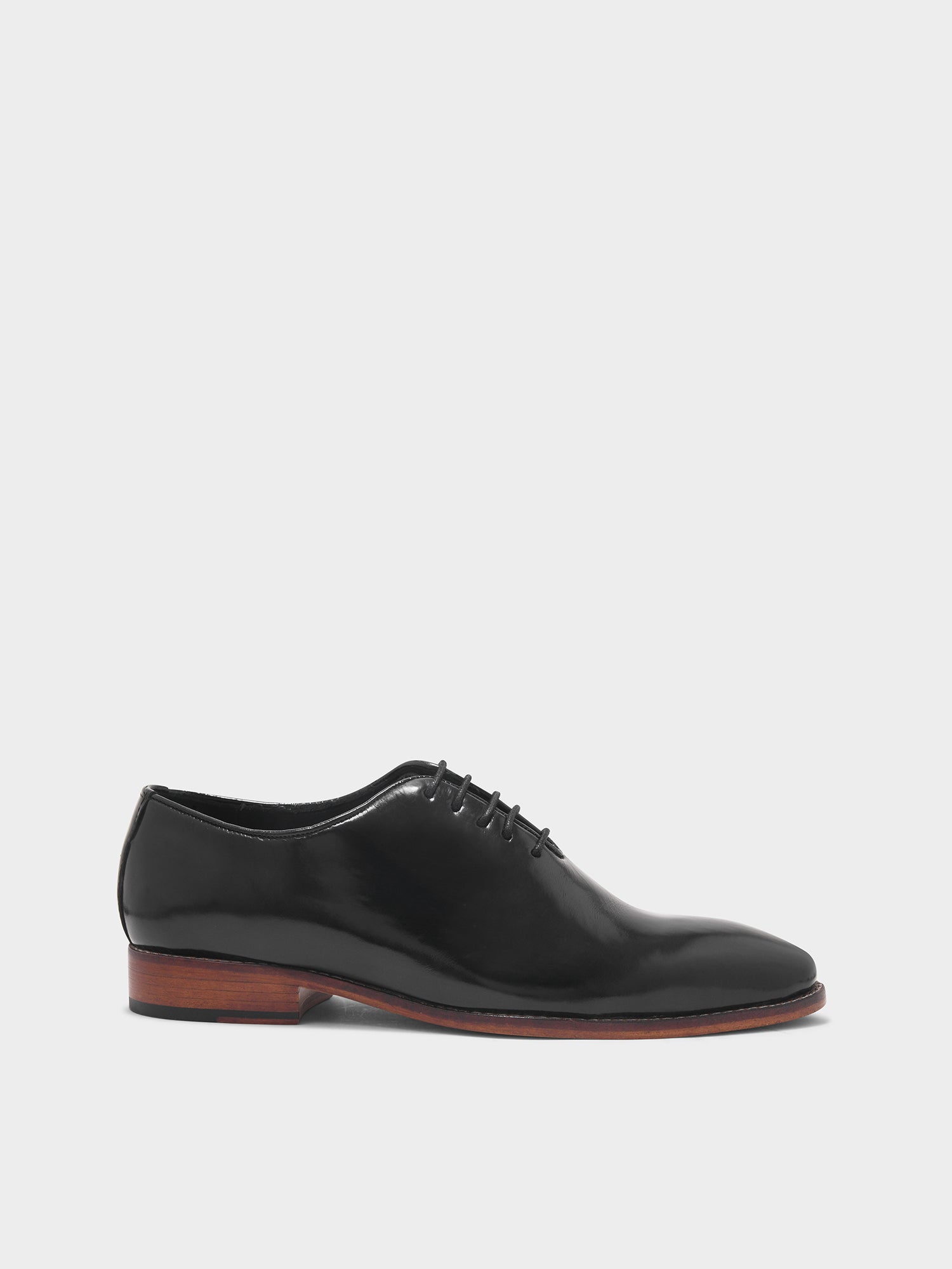 Black dress shoe on a white background