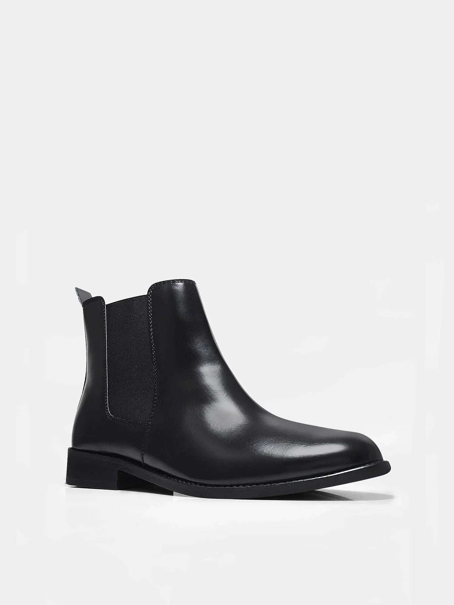 Black leather boots with side elastic and mid heel