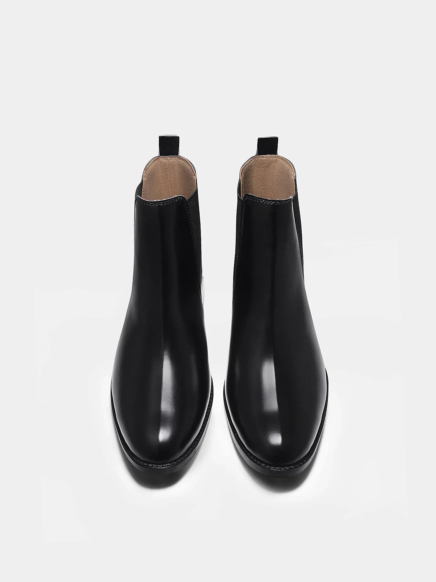Pair of black Chelsea boots with side elastic