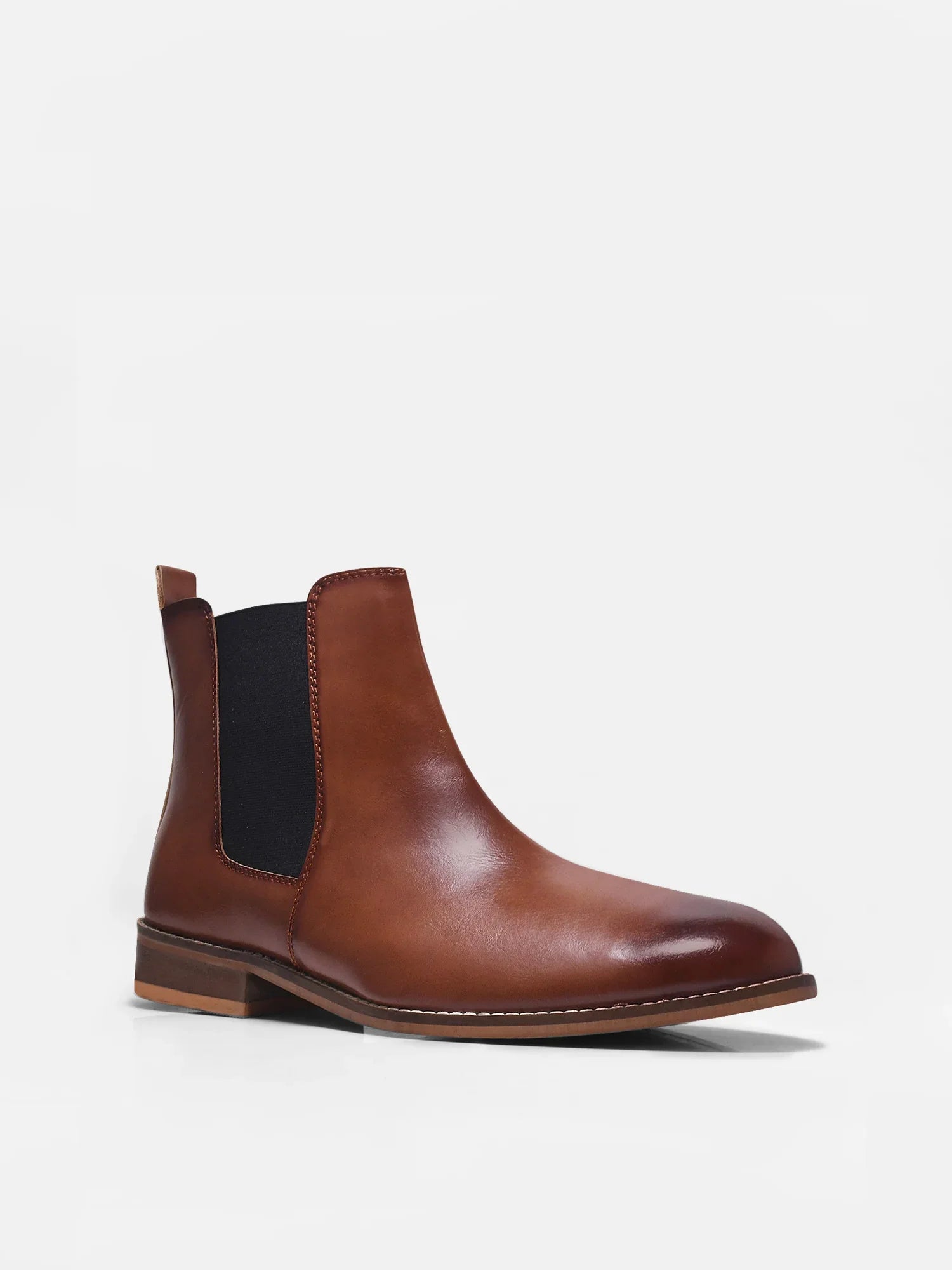Brown leather Chelsea boot with side elastic and mid heel on a white background