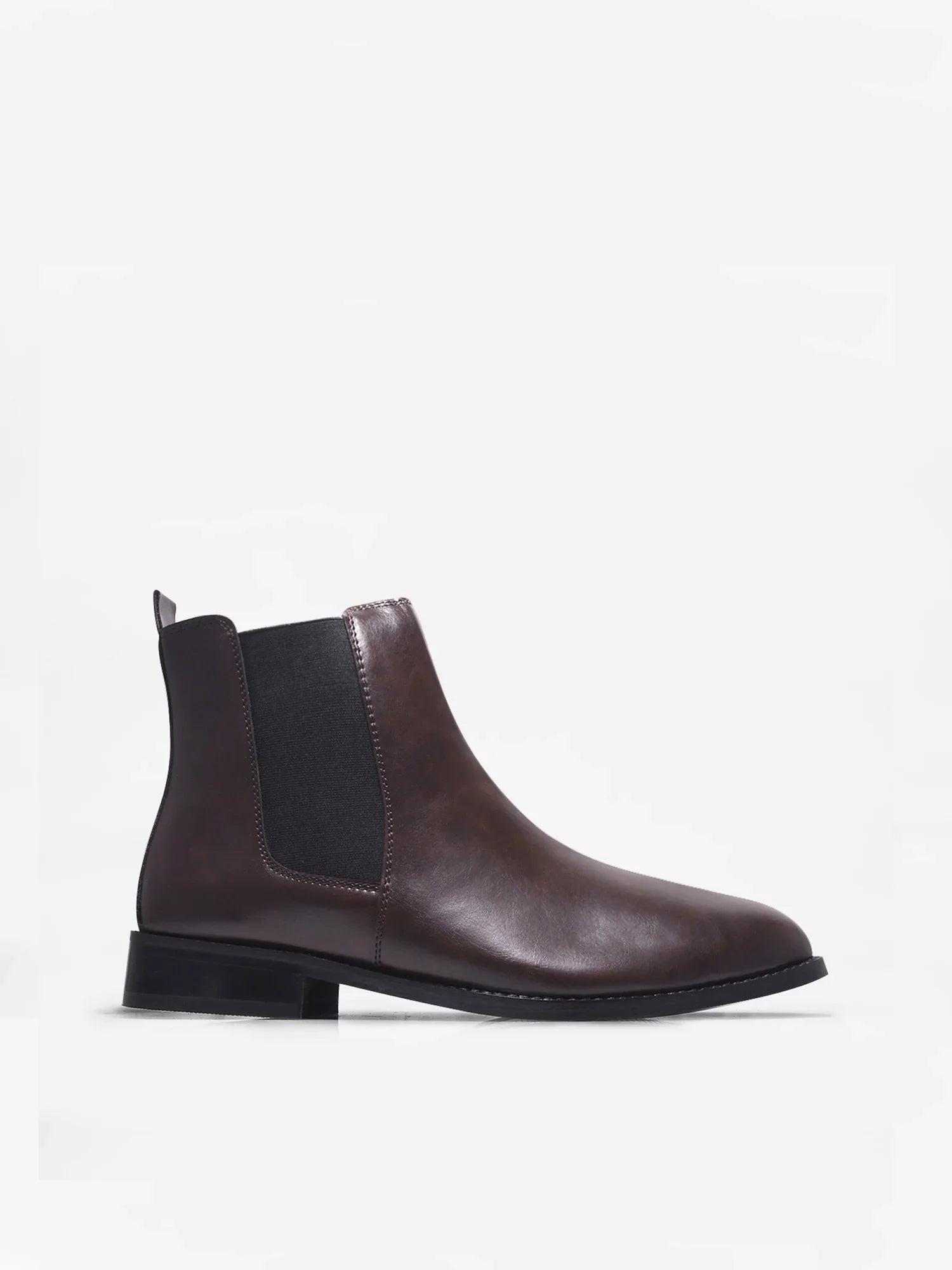 Brown leather Chelsea boot with side elastic and mid heel on a white background