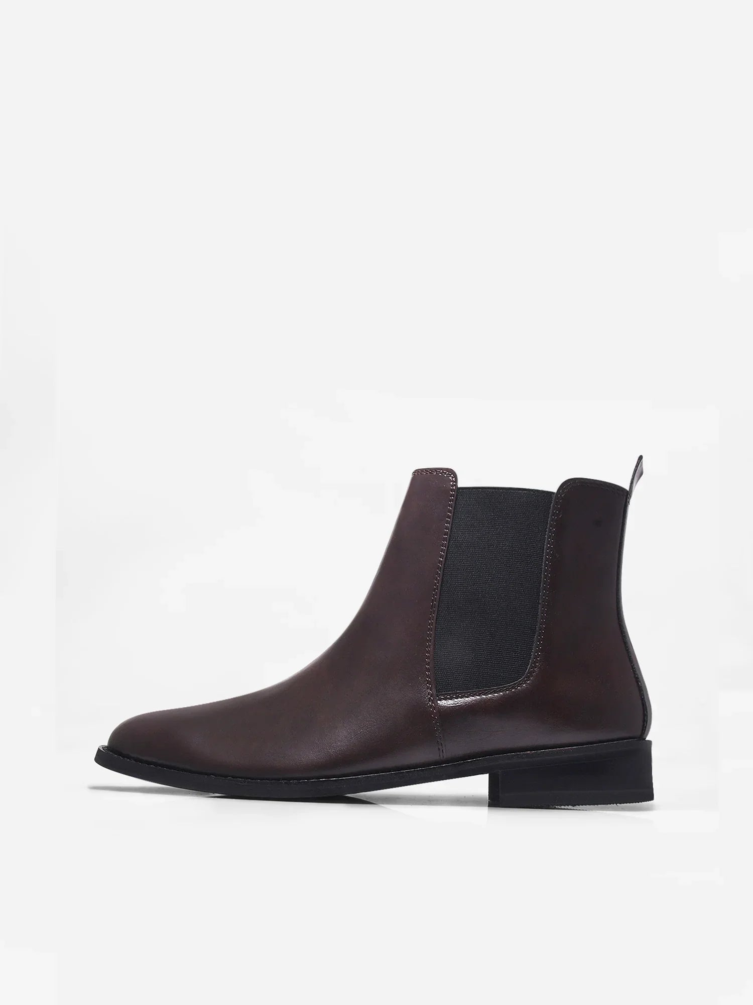 Brown leather Chelsea boot with side elastic and mid heel on a white background