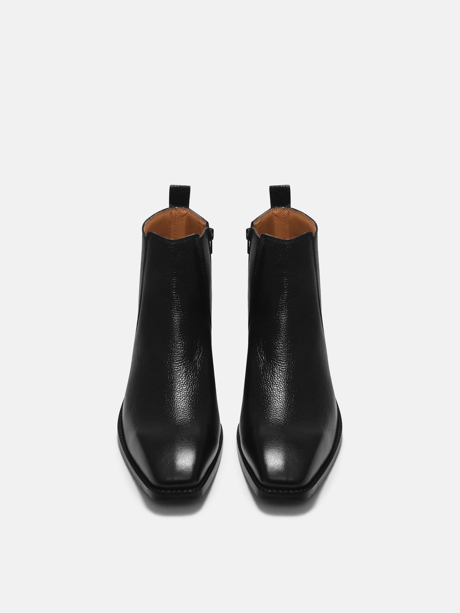 A men's leather side zip boot with a cuban heel, primarily black in color.