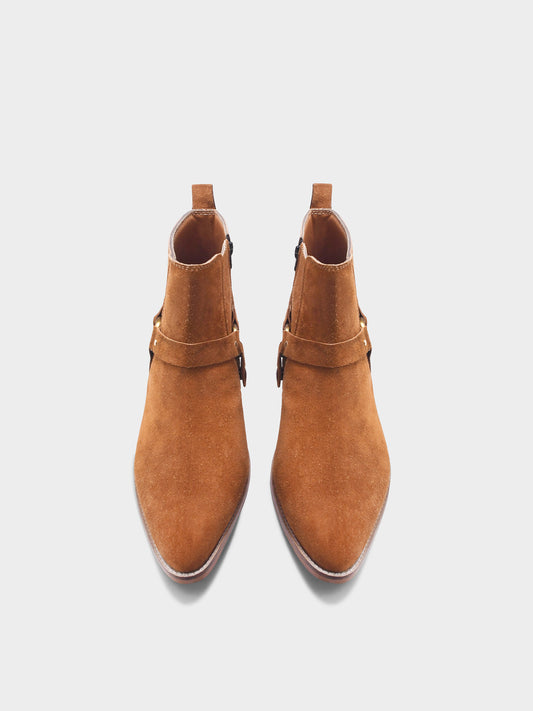 Pair of tan suede boots on Cuban heel with tan coloured buckle on side with golden accents