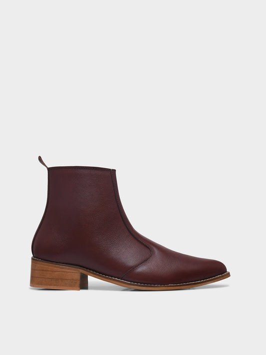 Brown leather ankle boot on a white background