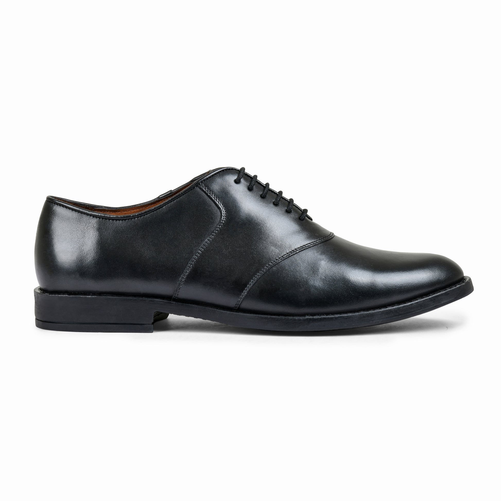 Black sneaker on a light gray background