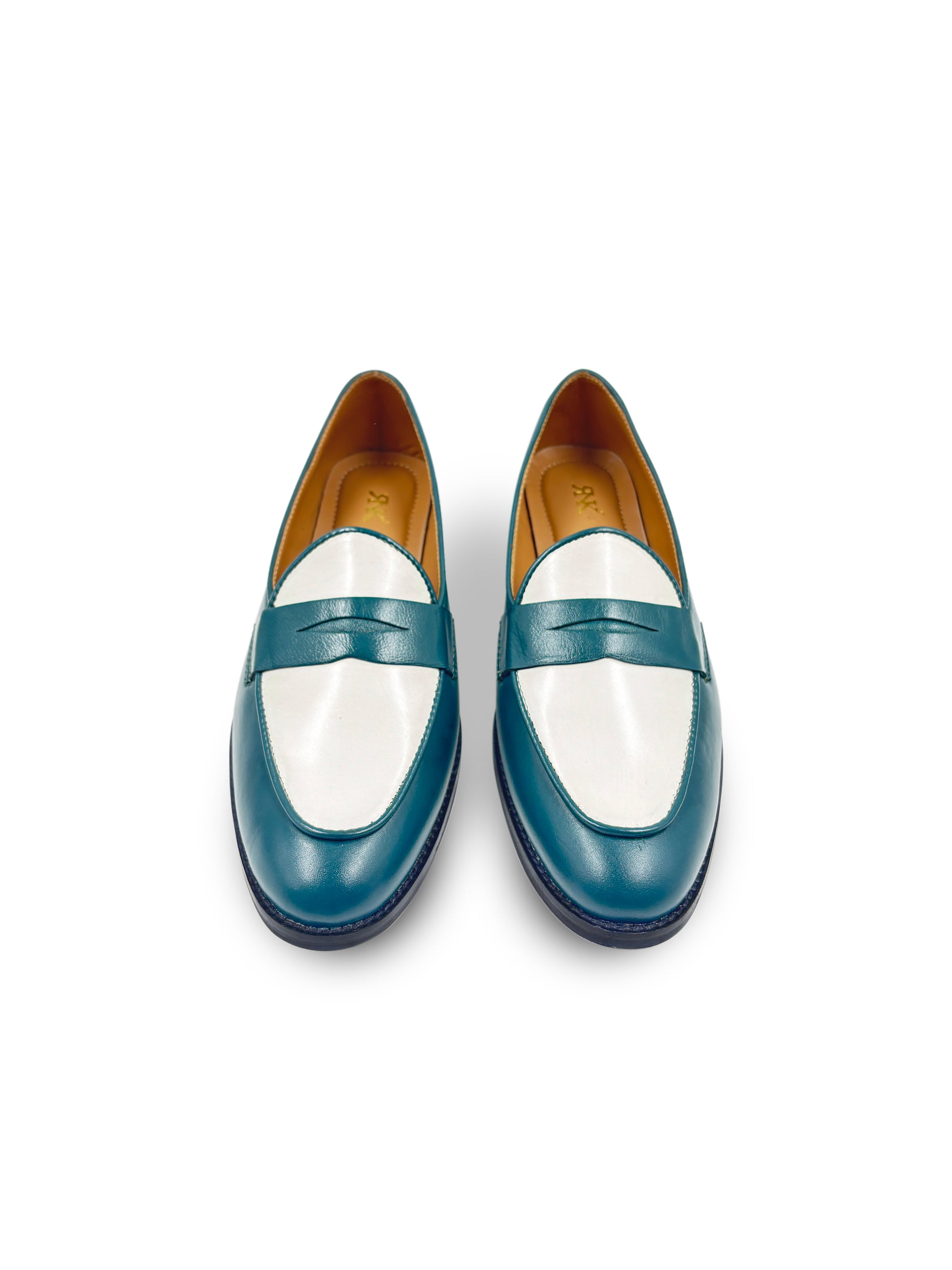 Pair of green leather penny loafers with white leather finish on top on mid heel