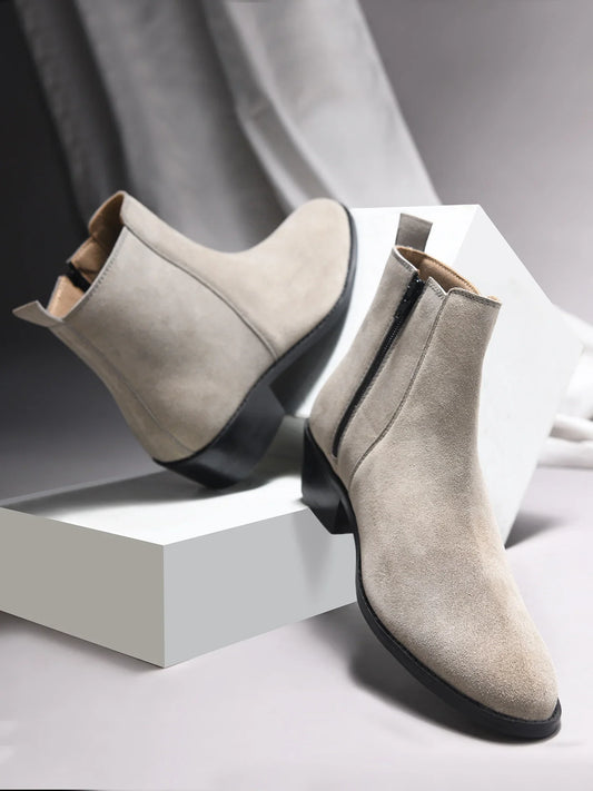 A men's luxury suede leather Chelsea boot with a cuban heel and zip side panels, in a gray color.