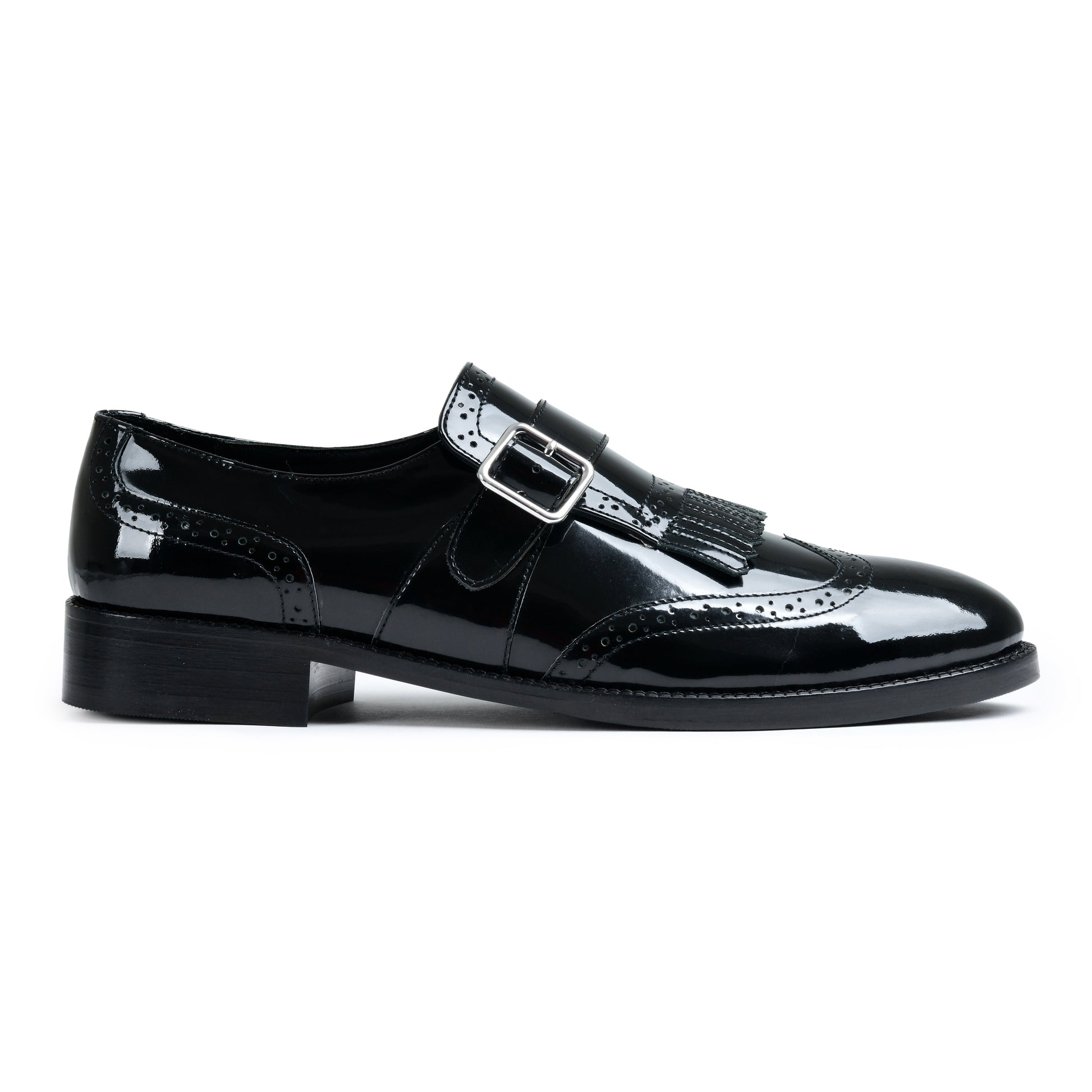 Black sneaker with a visible brand logo on a white background