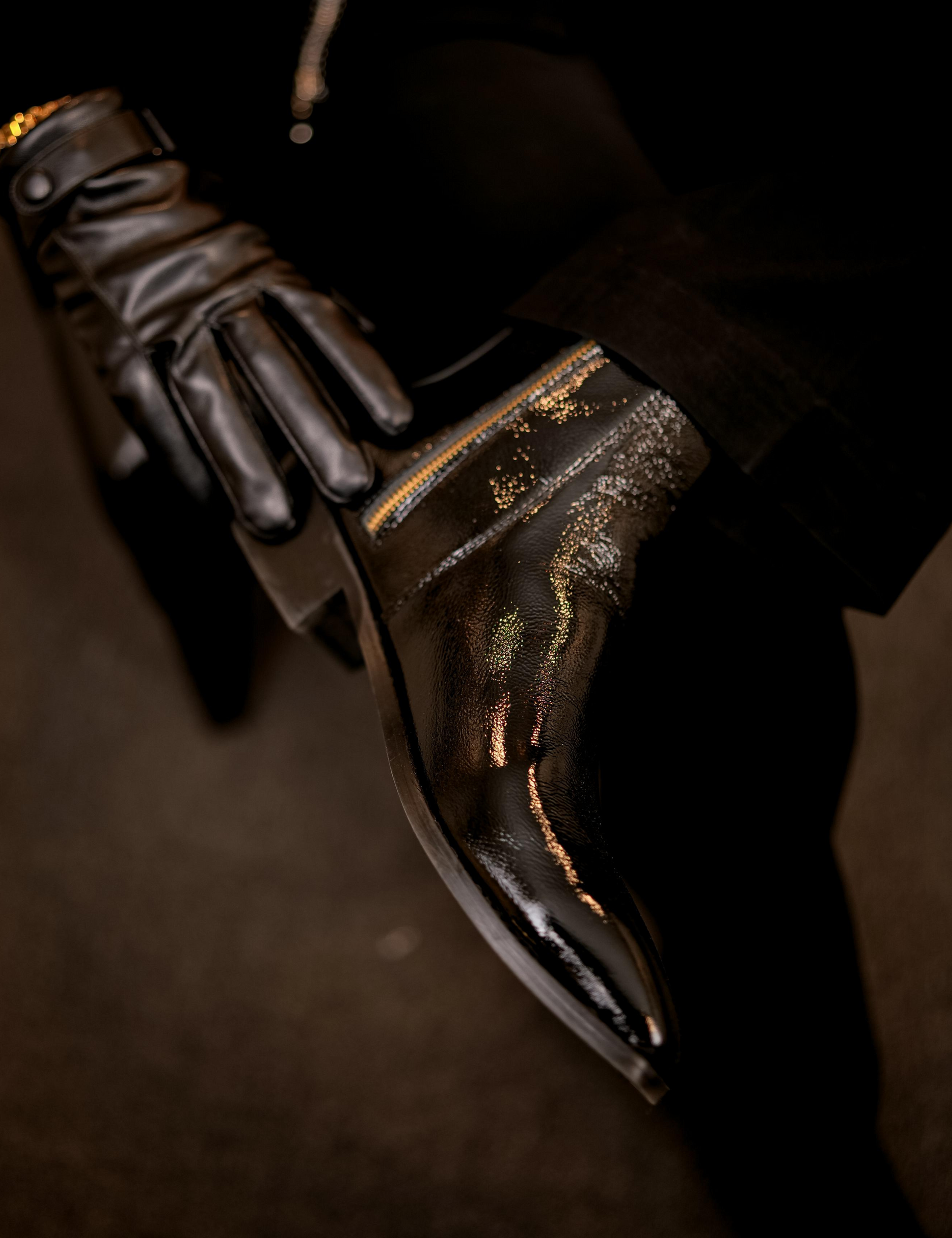 Close-up of a black patent boot named Knight walker designed b RNK Luxe