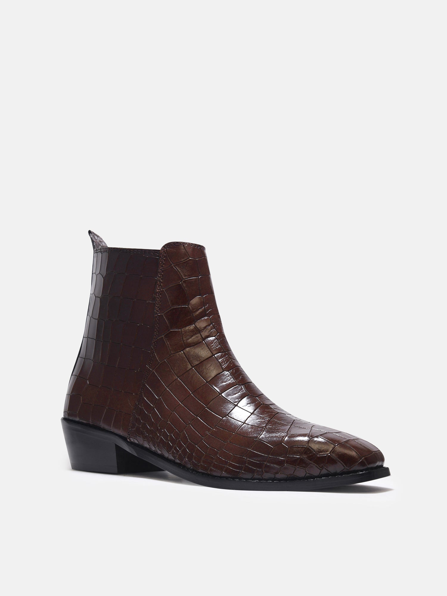 A brown leather side zip boot with a crocodile pattern and a Cuban heel.