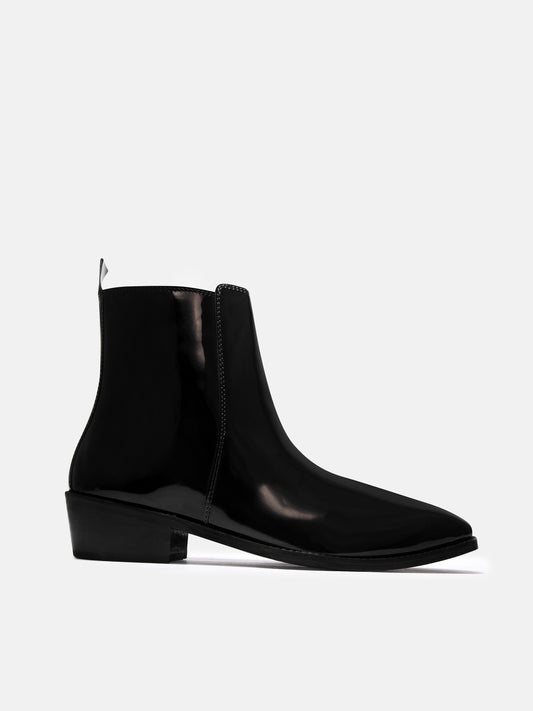 A man's patent leather boot in black or a Cuban heel