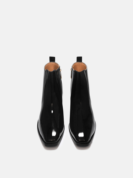 A man's patent leather boot in black or a Cuban heel