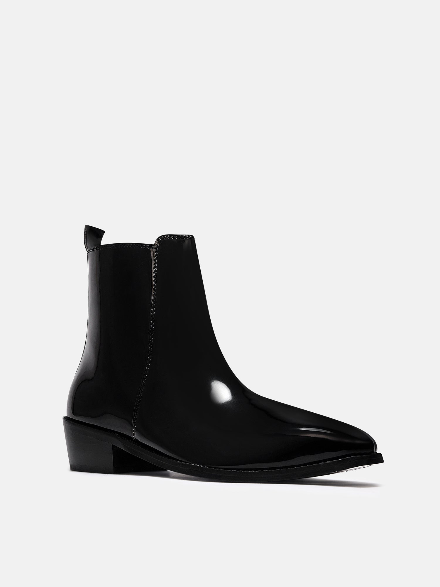 A man's patent leather boot in black or a Cuban heel