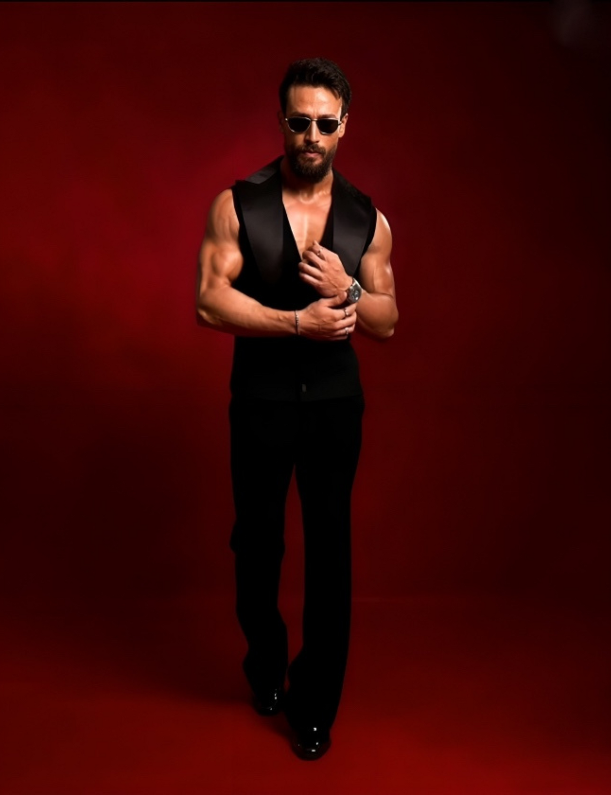 Tiger Shroff styling with LOKI, The black patent boot made by RNK Luxe