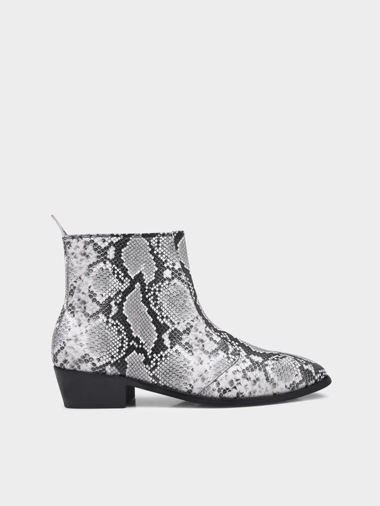 A pair of black and white snake printed leather boot with square toe and a black colour Cuban heel