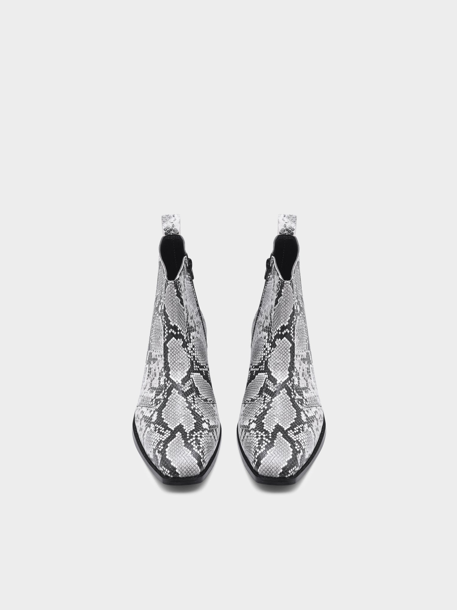 A pair of black and white snake printed leather boot with square toe and a black colour Cuban heel
