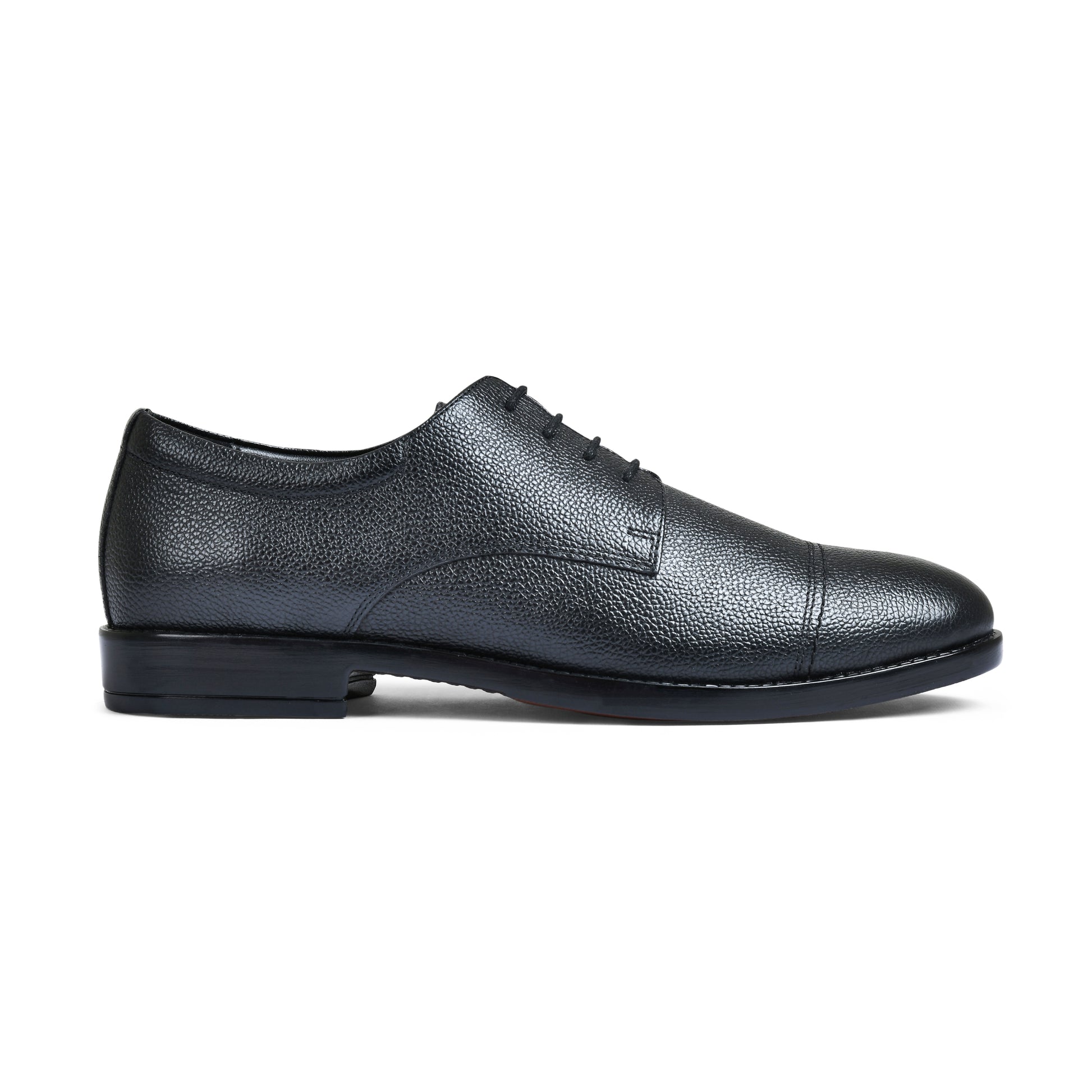 Black slip-on sneaker with Nike logo on a white background