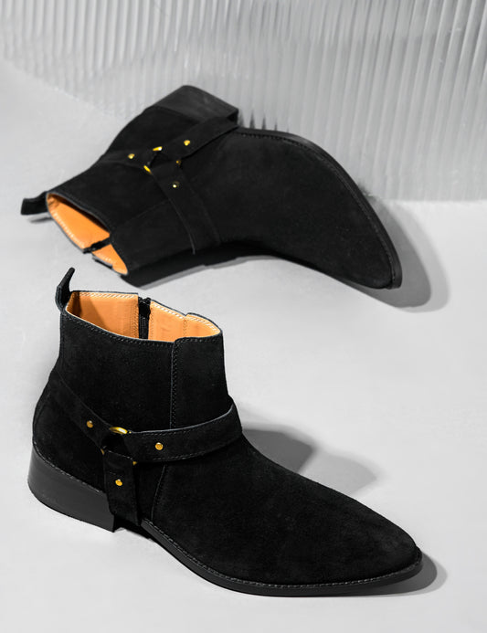 Phantom black suede harness boots for men featuring a pointed toe, side zip closure, and attached leather thong strap – luxury ankle boots by RNK Luxe for bold, stylish looks.