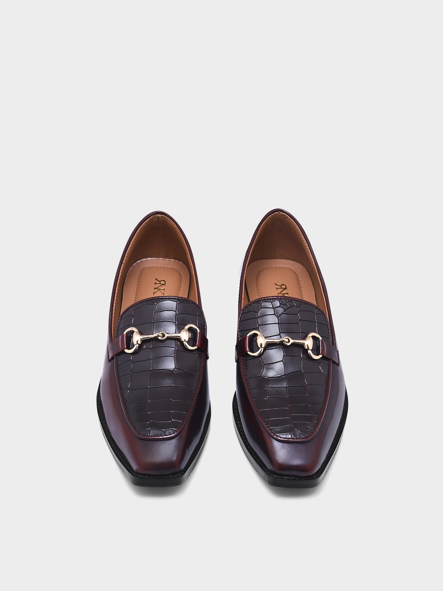 A pair of cherry leather loafer in which it embossed with brown croco leather on top with a golder horesit buckle