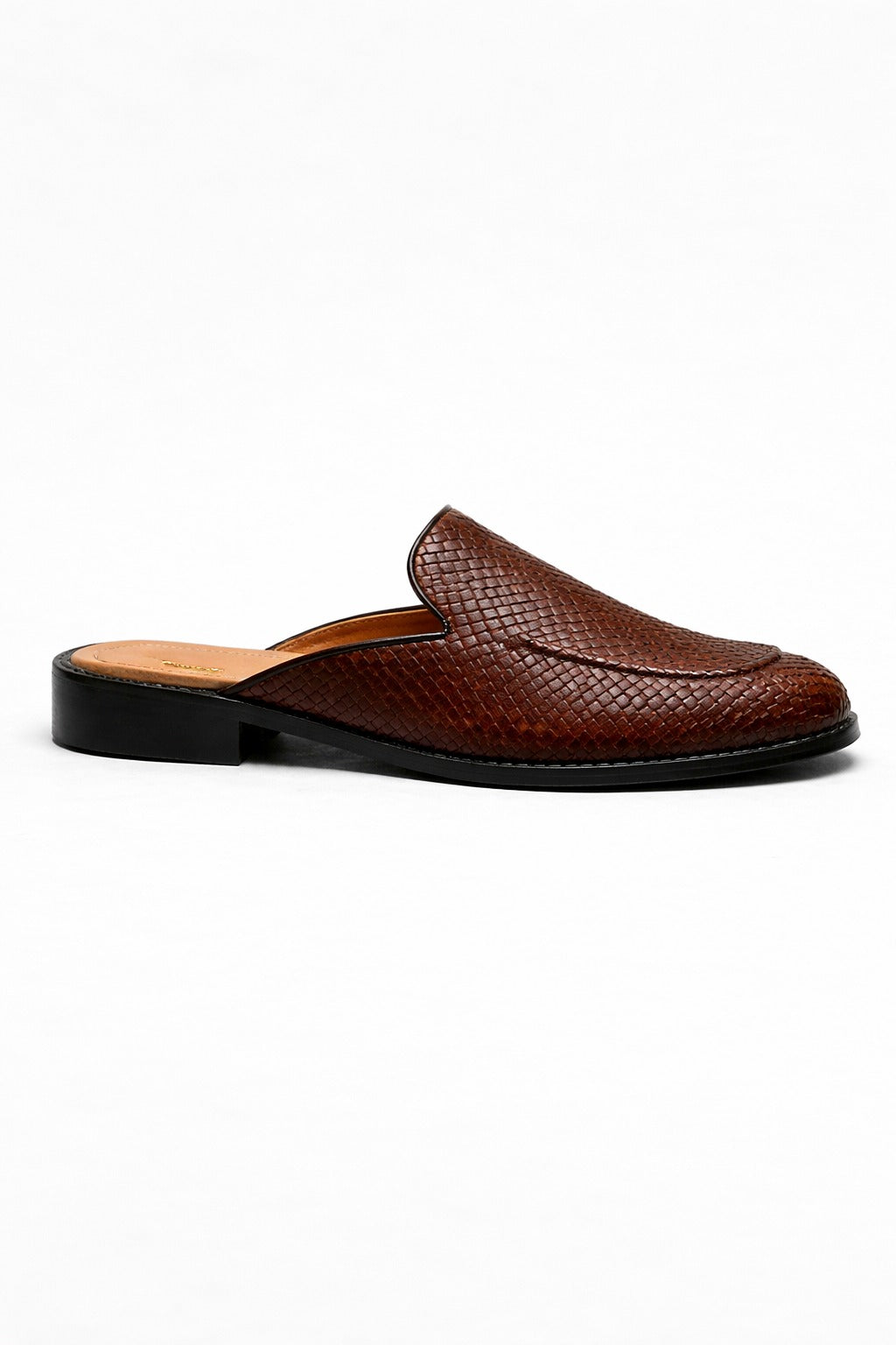 Brown leather slip-on shoe on a white background