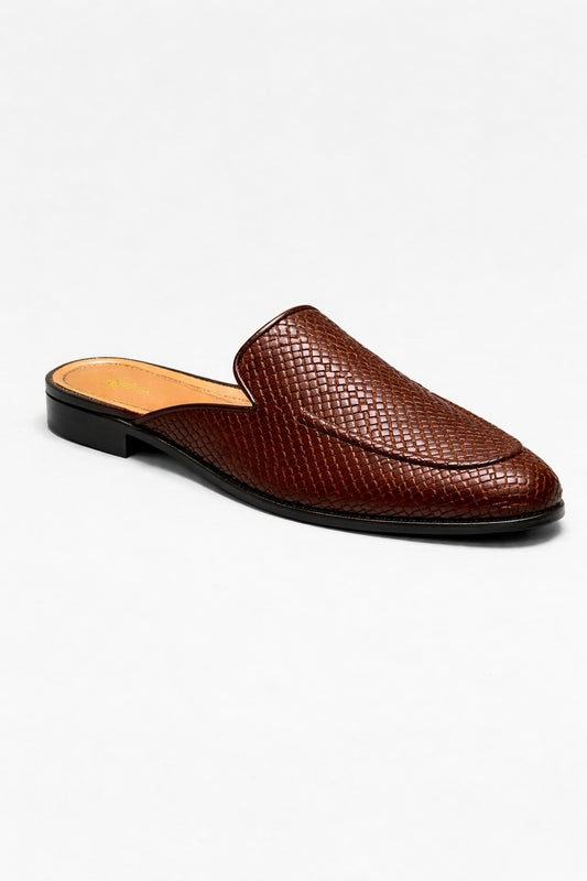 Brown leather slip-on shoe on a white background