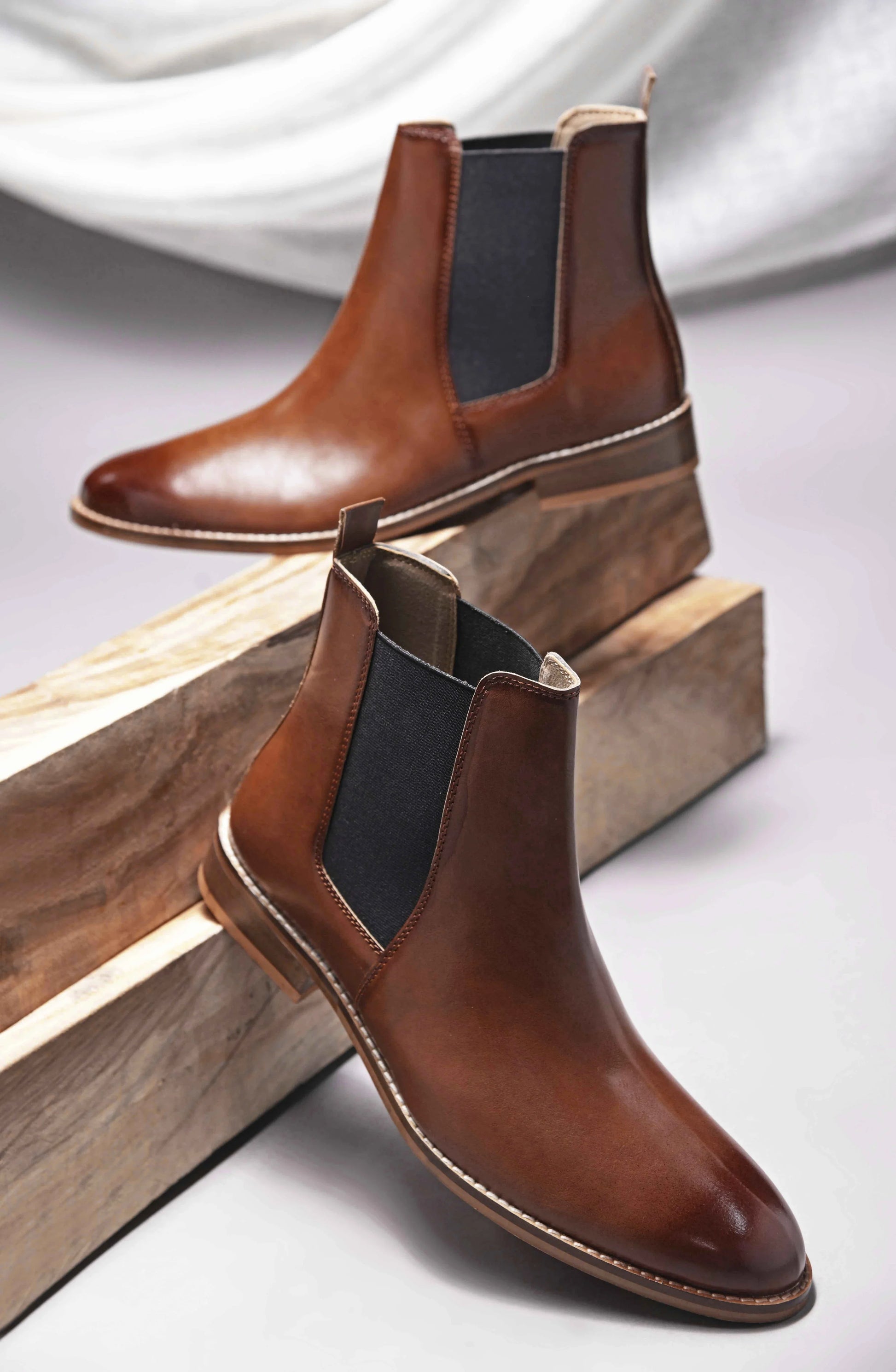 Tan leather Chelsea boot with side elastic and mid heel 