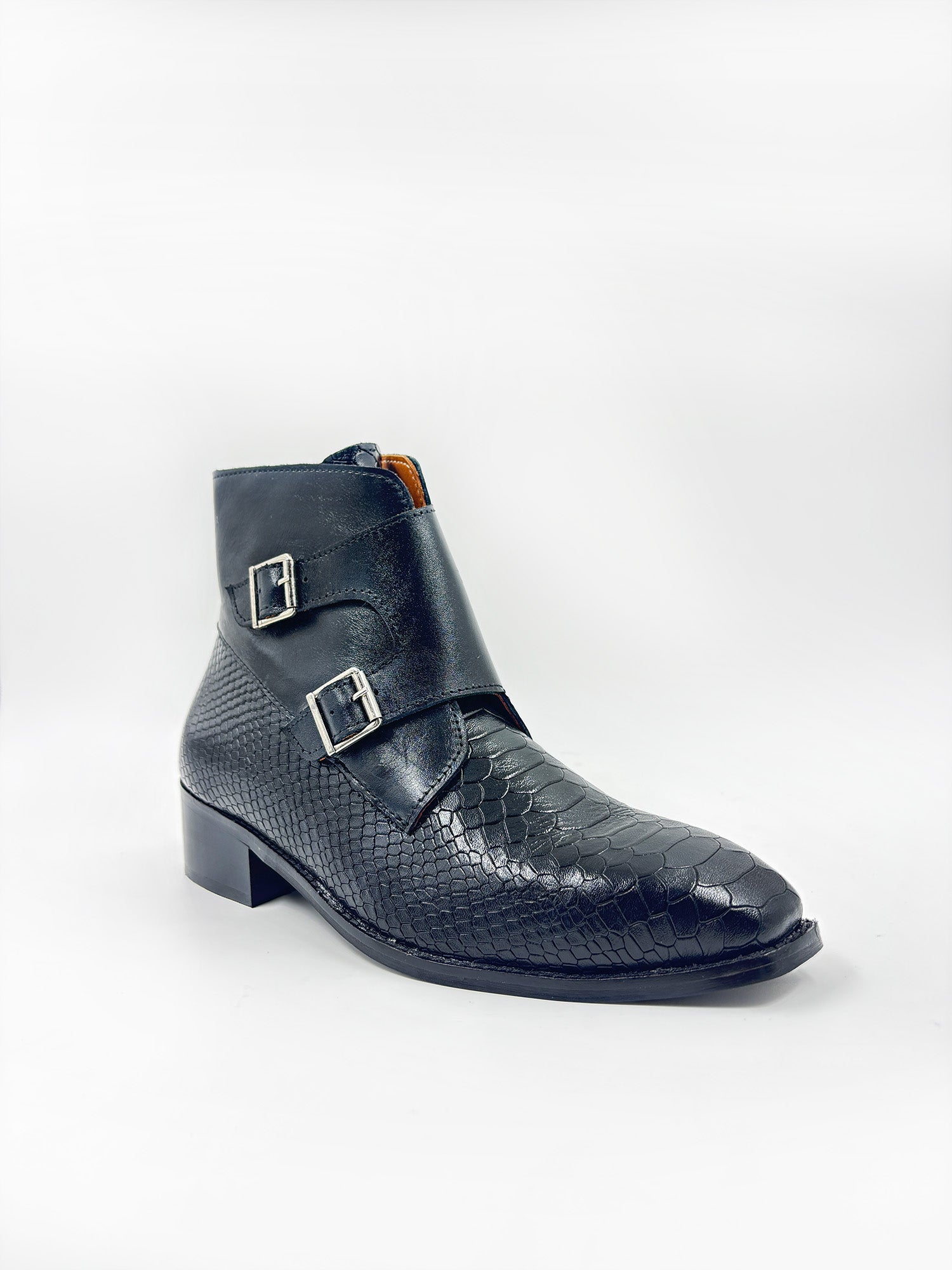 Black leather boot with double buckle on a white background
